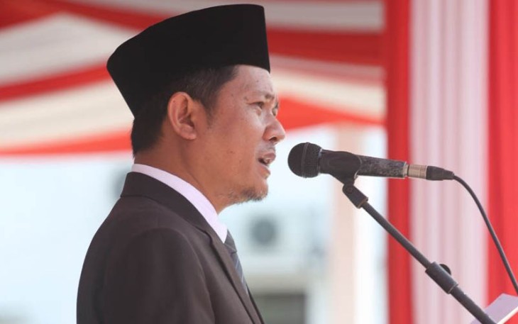 Sekertaris daerah kota Bitung saat membacakan sambutan Menteri Pemuda Dan Olahraga RI dalam upacara sumpah pemuda ke-94.