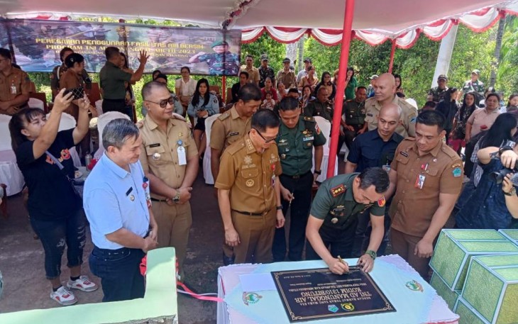 Bupati Minahasa Utara Didampingi Dandim 1310/Bitung saat Meresmikan Fasilitas Air Bersih