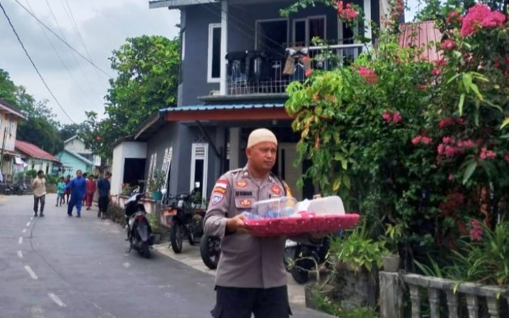 Bhabinkamtibmas Batu Lepuk Angkat Talam Bingke Tradisi Masyarakat di Kecamatan Tambelan