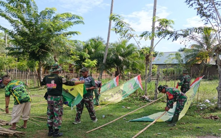 Satgas TMMD Ke-124 Kodim 0408/BS dan Warga Gotong Royong Siapkan Lapangan