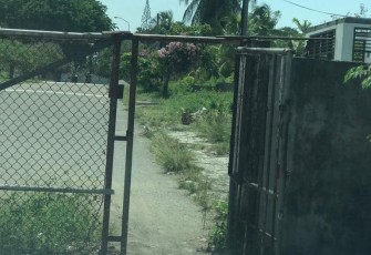Pintu Akses ke Sekolah dan Masjidyang berada di dalam Komplek eks PT Asean Aceh Fertilizer (AAF)