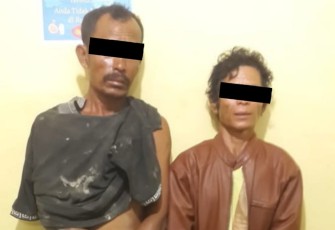 Dua orang tersangka saat ditangkap
