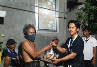PMII Jakarta Utara Bagikan Ratusan Nasi Bungkus untuk Pekerja Informal