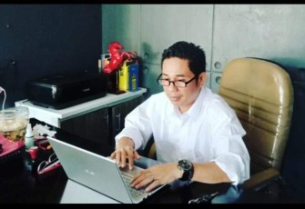 Elfahmi Lubis 
