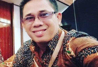 Elfahmi Lubis 