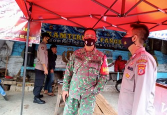 Kapolsek Cisompet - Polres Garut, Pimpin Kegiatan Sosialisasi dan Edukasi Prokes di Massa PPKM Level 3