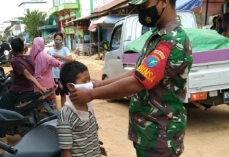 Gencarkan PPKM Mikro dan Bagikan Masker