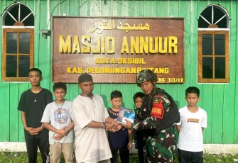 Papan Masjid Karya Prajurit Satgas Yonif 310/KK