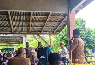 Bhabinkamtibmas Hadiri Panen Ikan Patin oleh Bupati Gusnan Mulyadi