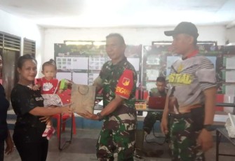 Satgas TMMD Ke-116 Kodim 1310/Bitung berikann bantuan Susu dan Vitamin kepada anak-anak