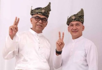 Wan Siswandi dan Rodhial Huda Tanggu