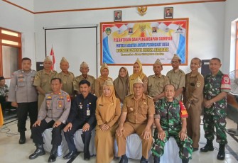 Danramil Jiwan saat Menghadiri Pelantikan dan Pengambilan Sumpah Jabatan Perangkat Desa