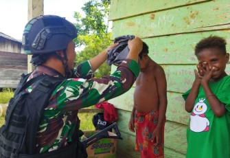 Ramadhan berkah satgas Yonif 310/KK