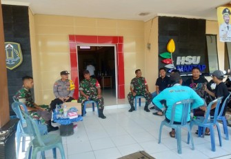 Babinsa Koramil 1001-10/Babirik Kodim 1001/HSU-BLG Kopral Satu Zainudin yang siap mengawal keamanan pesta demokrasi Indonesia hingga tuntas, Senin, (19/02).