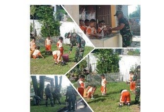 Personil Kodim 1310/Bitung bersama anak-anak TK Petra Madidir saat melaksanakan Kegiatan Korve Massal 