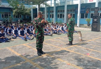 Tanamkan Cinta Tanah Air Sejak Dini, Koramil Kartoharjo Bekali Ratusan Pelajar SMK dengan Wasbang dan PBB