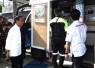 Presiden Joko Widodo saat meninjau bank mobile BUMN di kantor pos kota Baubau, provinsi Sulawesi Tenggara,Selasa (27/9)