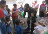 Pemberian bubur di Pos Nunura 
