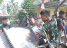 Prada Habibilah dan Aipda Agus Wahyunianto kompak masulkan material pengecoran