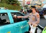 Kapolres Metro Depok Kombes Pol. Dr. Christian Rony Putra